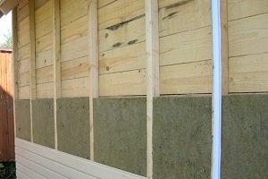 Крепление утеплителя к деревянной стене: выбор материалов и правила работы с ними